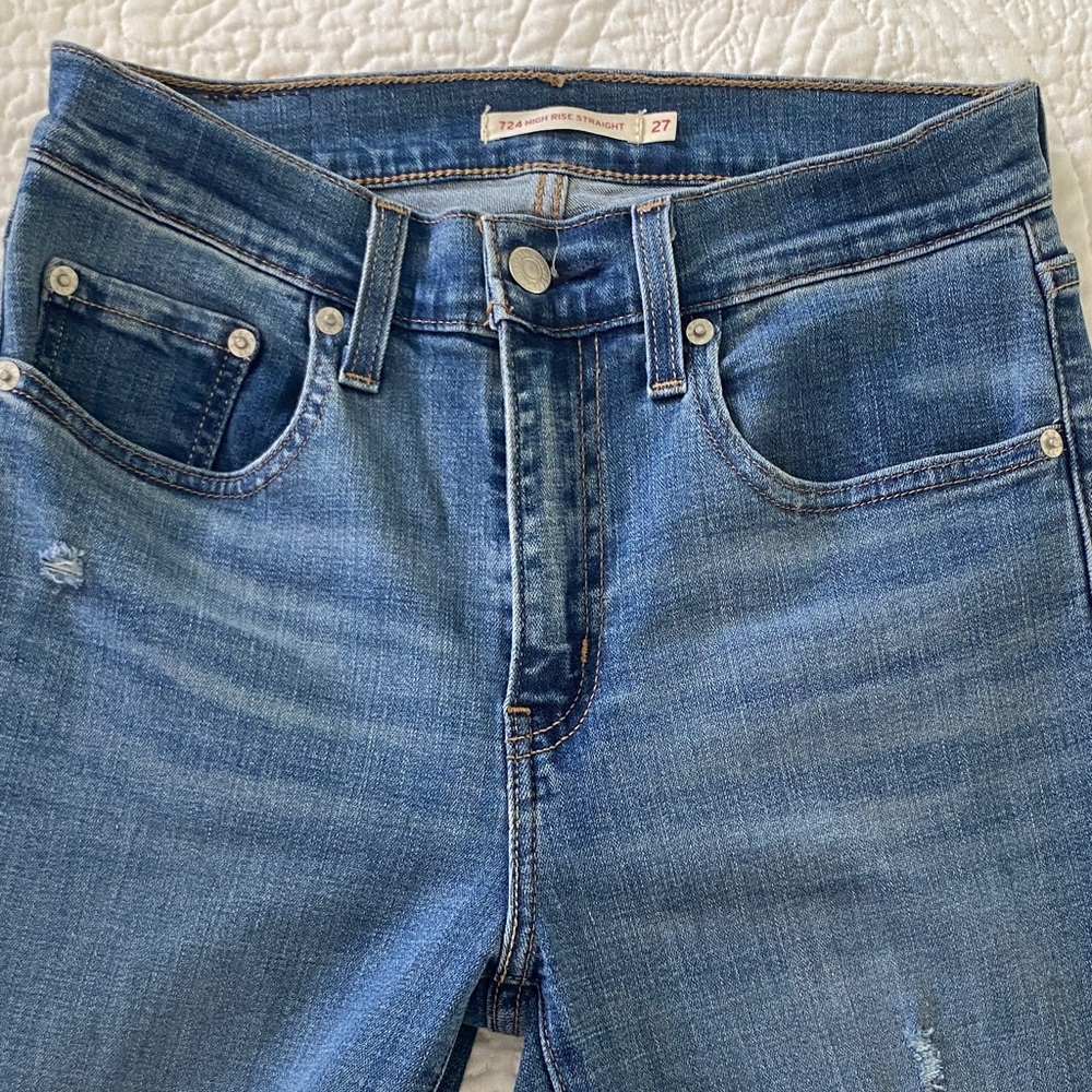 Distressed Blue Denim Jeans